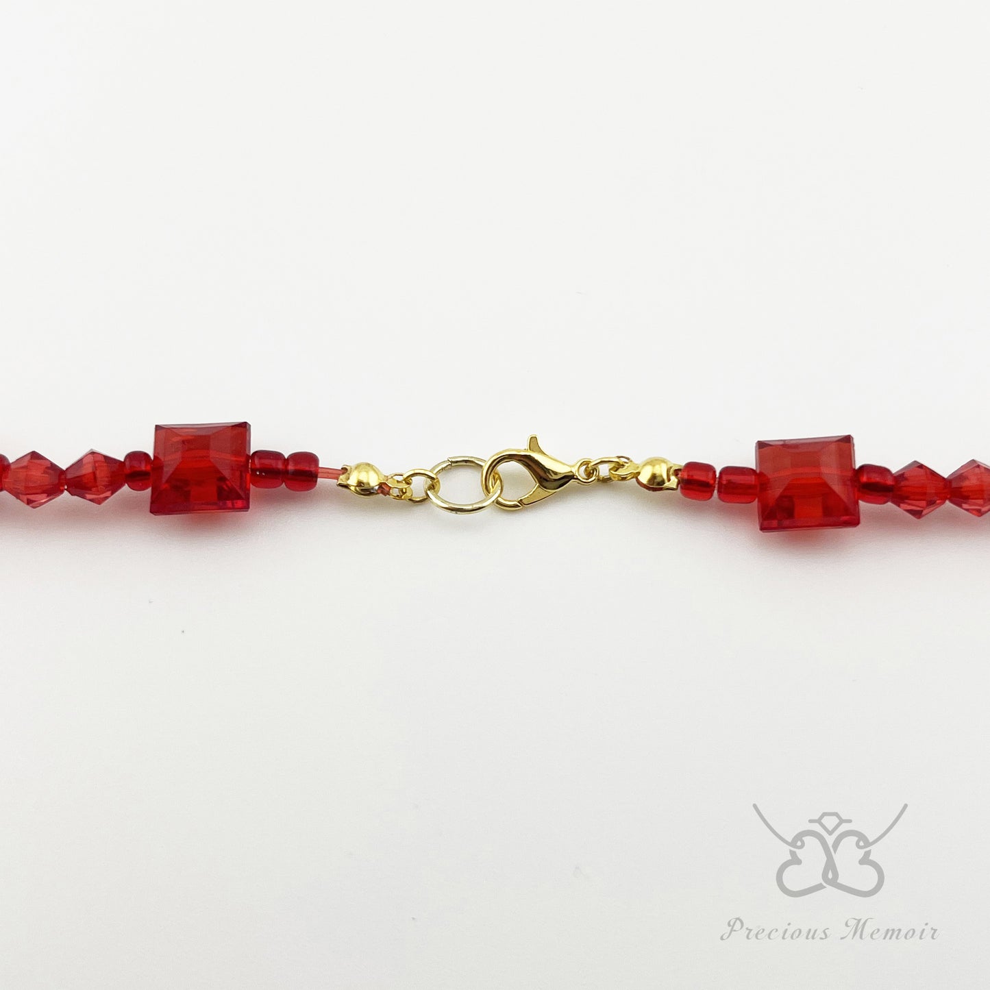 Red Bead Necklace w/ White Swirl Paint & Cracked Stone Design