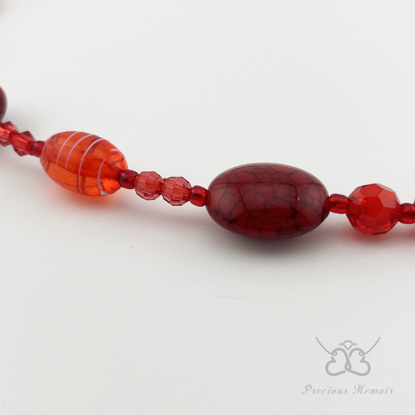 Red Bead Necklace w/ White Swirl Paint & Cracked Stone Design