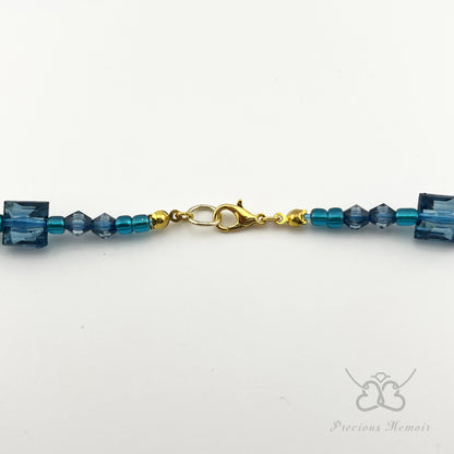 Blue Bead Necklace w/ Multi-Faceted Translucent Crystal Design